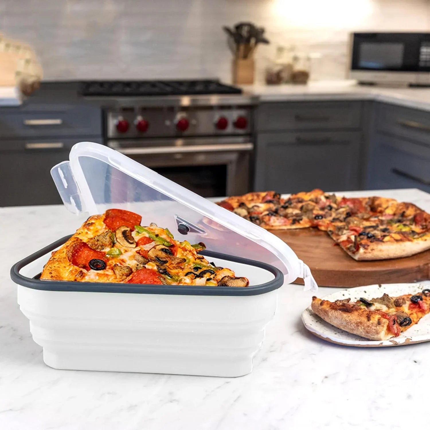Reusable, Collapsible silicone pizza storage container.