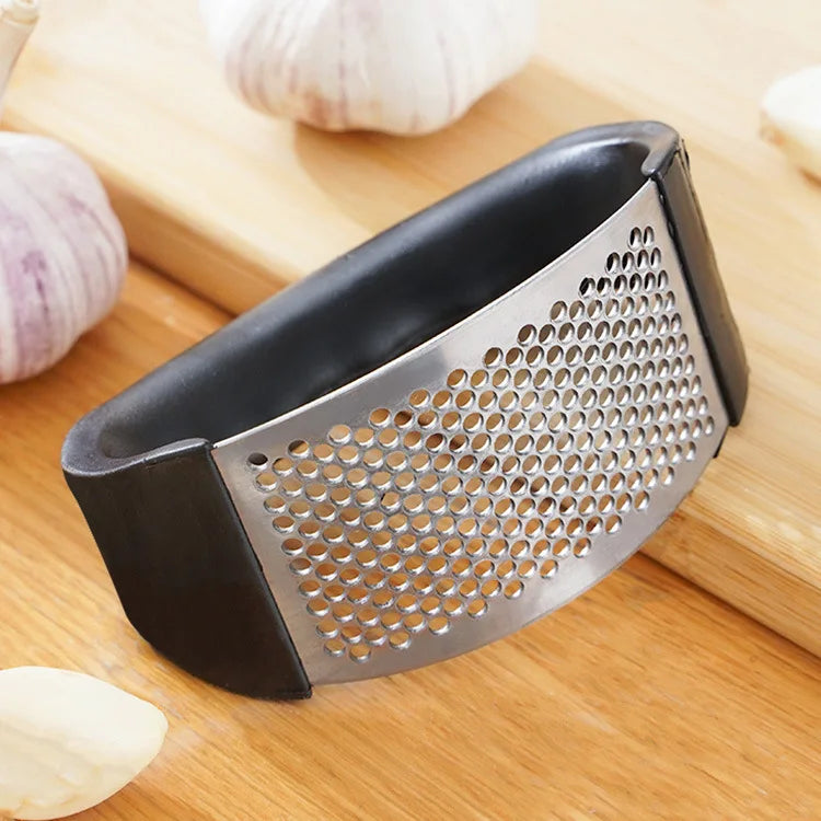 Manual stainless Steel Garlic Press Crusher.