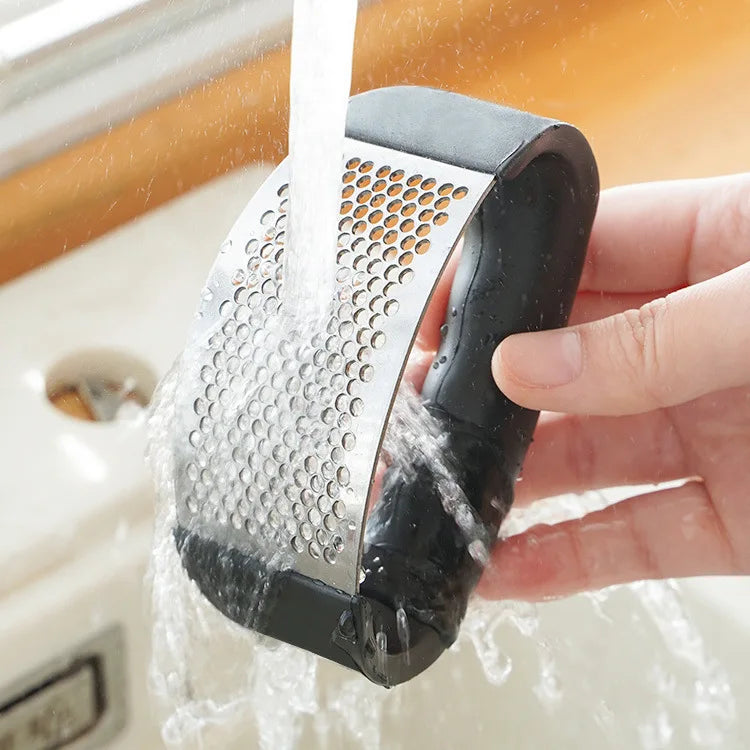 Manual stainless Steel Garlic Press Crusher.