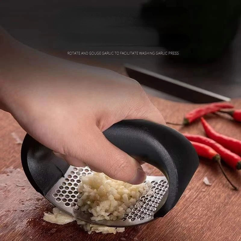 Manual stainless Steel Garlic Press Crusher.